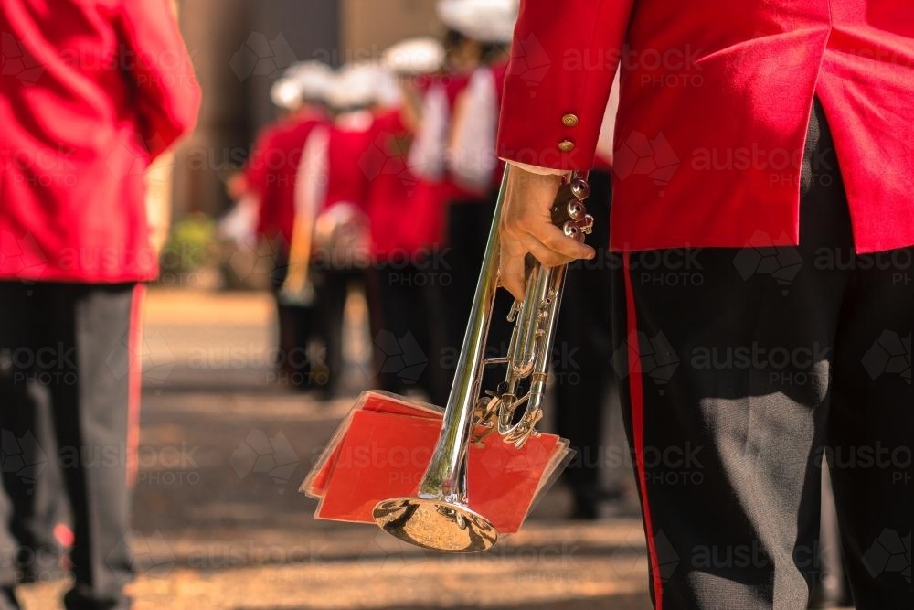 Town band trumpet player getting ready for the ANZAC Day march - Australian Stock Image