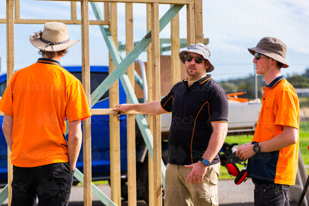 Image of Trade instructor teaching students during hands on learning ...