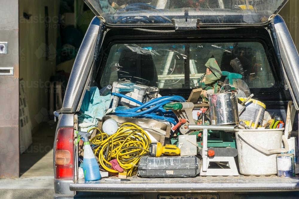 Tradesman's tools and equipment in the back of a car - Australian Stock Image