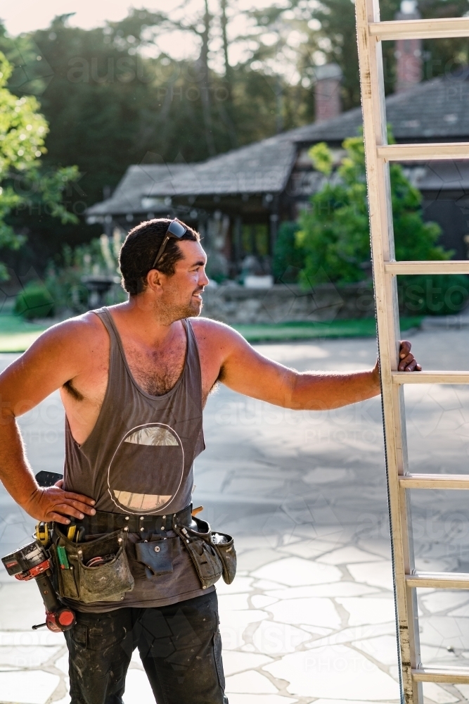 tradie and ladder - Australian Stock Image