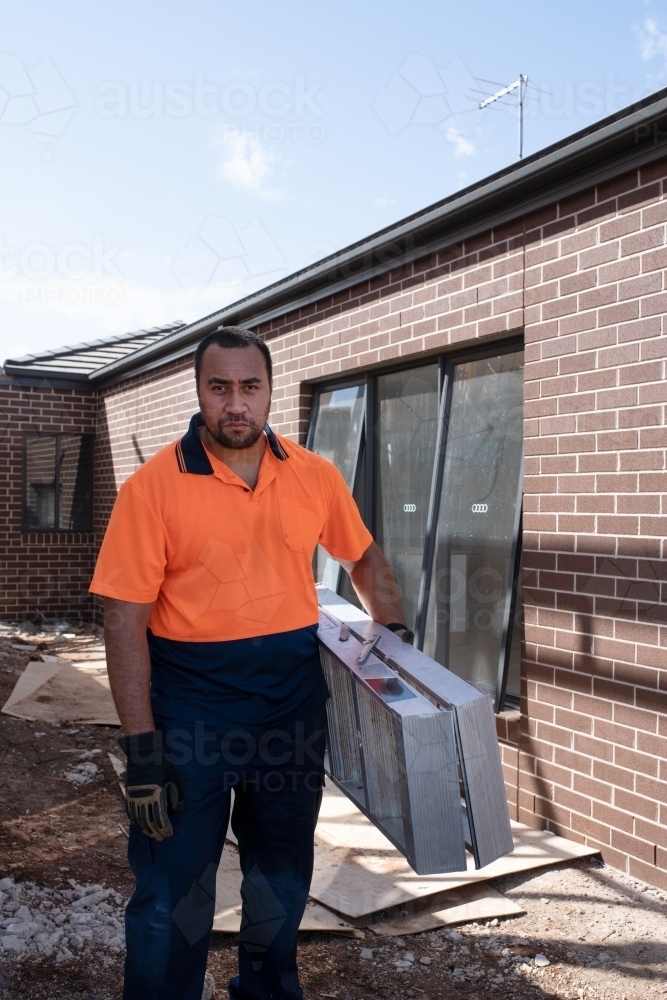 Tradie at work on building site - Australian Stock Image