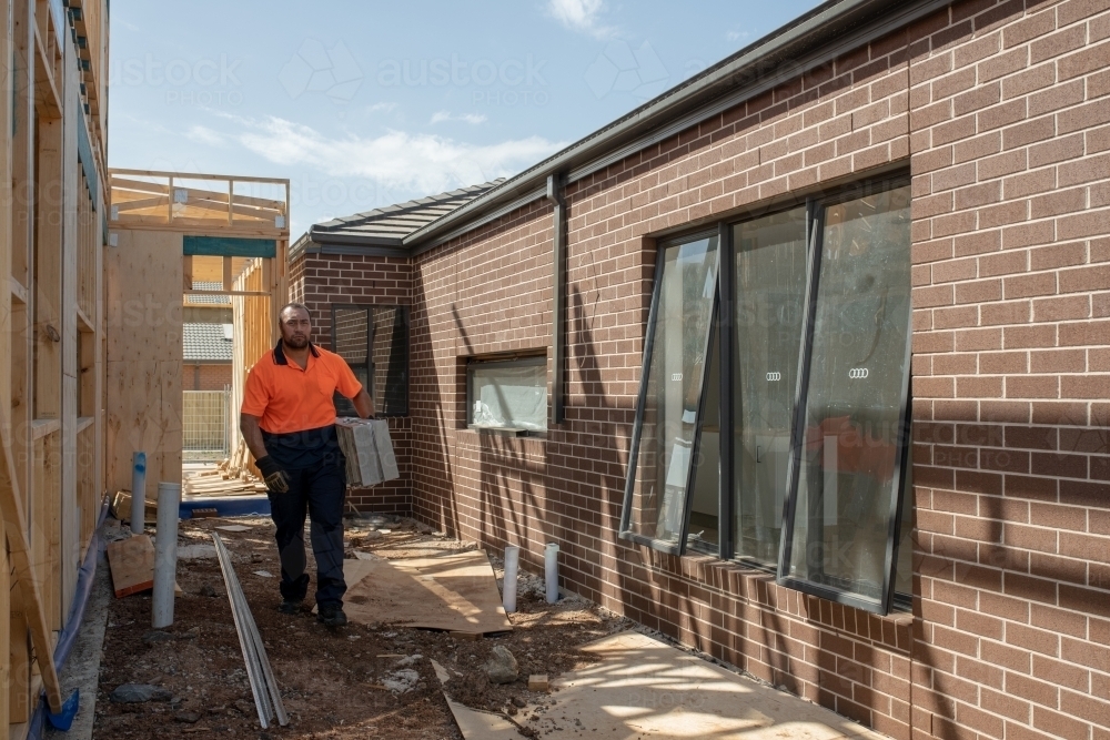 Tradie at work on house building site - Australian Stock Image