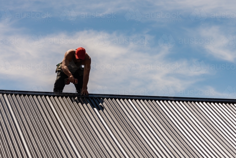 tradie working on the roof - Australian Stock Image