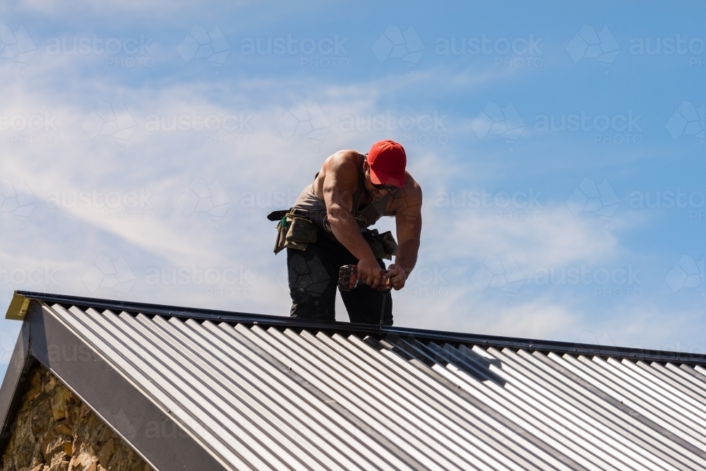 tradie working on the roof - Australian Stock Image