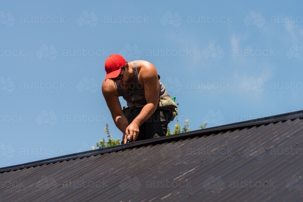 tradie working on the roof - Australian Stock Image