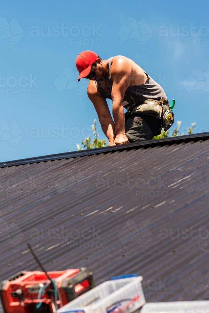 tradie working on the roof - Australian Stock Image