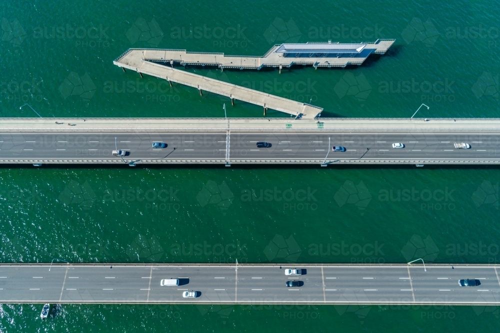 Traffic on two bridges over water. - Australian Stock Image