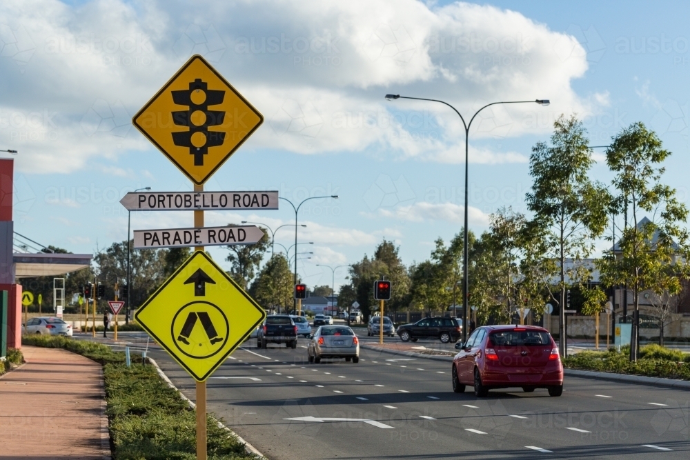 Traffic signal sign at suburban street intersection - Australian Stock Image