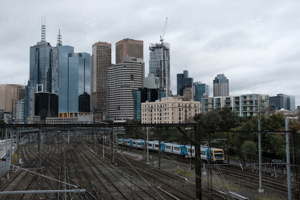 Train, Railway Tracks and Office Buildings of Melbourne CBD - Australian Stock Image
