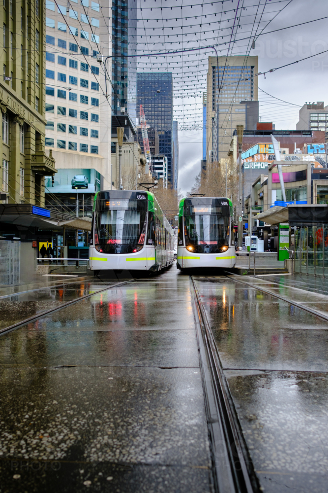 Trams in Melbourne CBD on a Cloudy Wet Day - Australian Stock Image