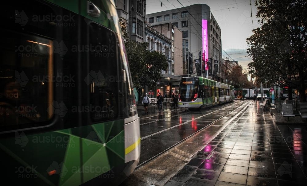 Trams on Bourke Street Mall in the morning - Melbourne CBD - Australian Stock Image