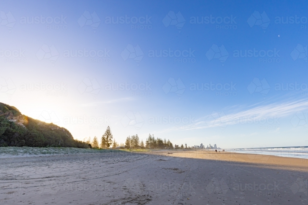 Tranquil beach afternoon with view of the Gold Coast city skyline - Australian Stock Image