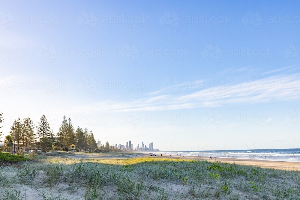 Tranquil beach afternoon with view of the Gold Coast city skyline - Australian Stock Image