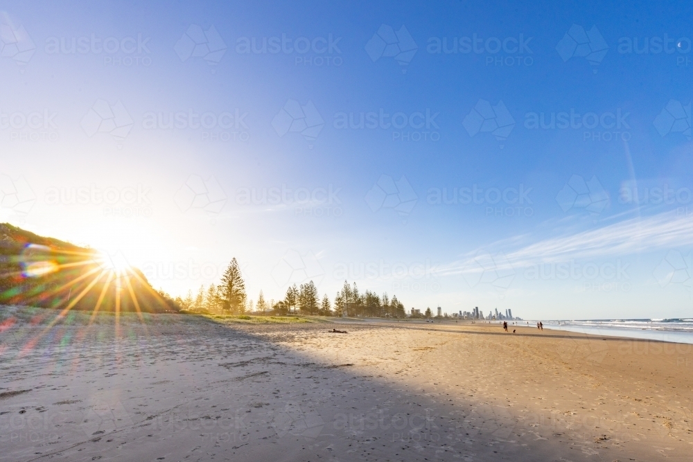 Tranquil beach afternoon with view of the Gold Coast city skyline - Australian Stock Image