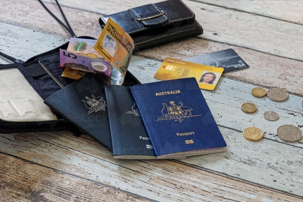 Travel documents, passport, driver's license, credit cards, money - Australian Stock Image