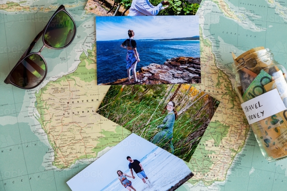Travel in Australia concept photos of past holidays and sunglasses and savings on map - Australian Stock Image