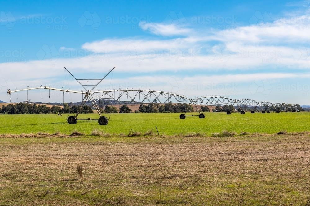 Travelling irrigator on paddock - Australian Stock Image