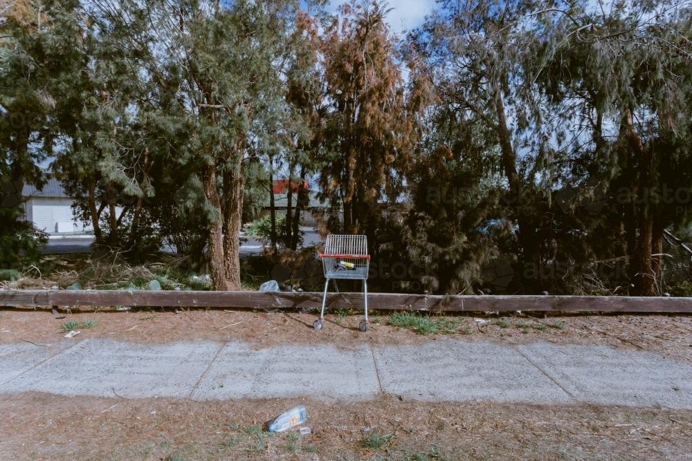 Trolley along street with rubbish - Australian Stock Image