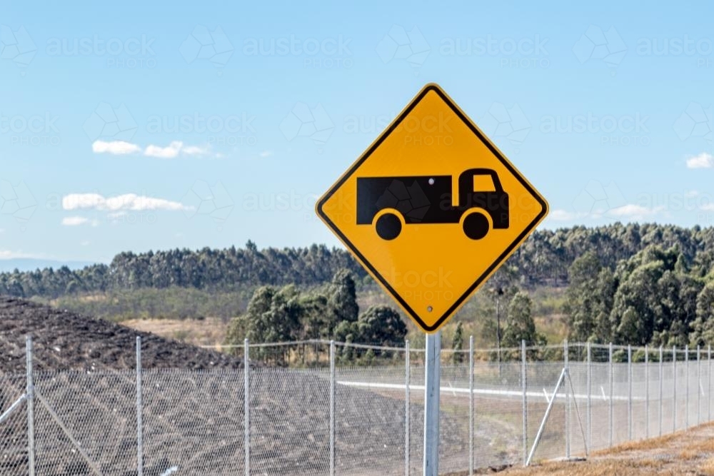 Truck Road Sign with Fencing Behind - Australian Stock Image
