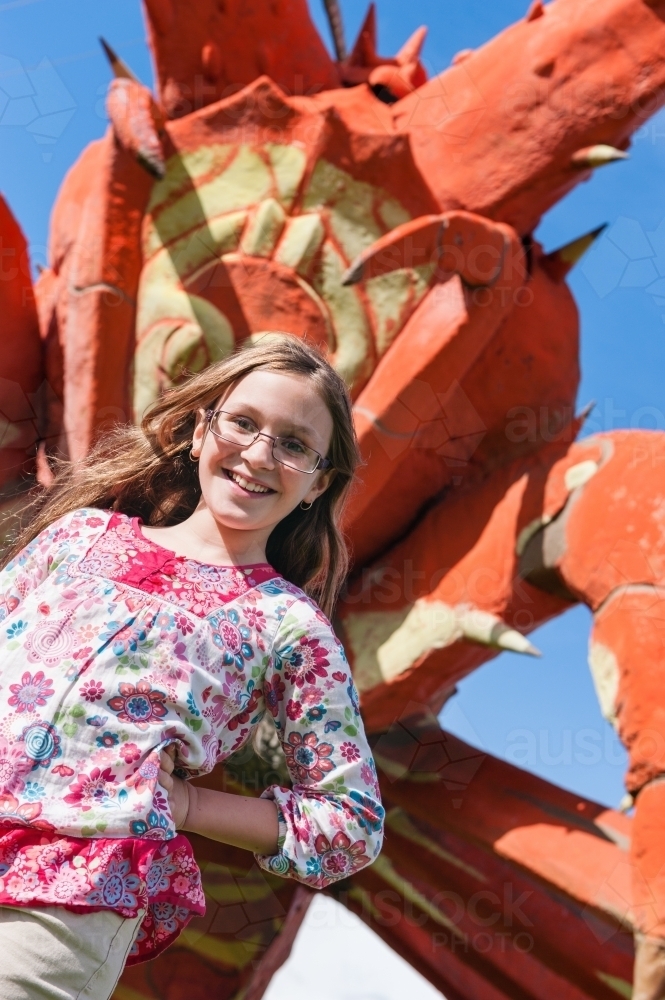 Tween girl at the giant crayfish, South Australia - Australian Stock Image