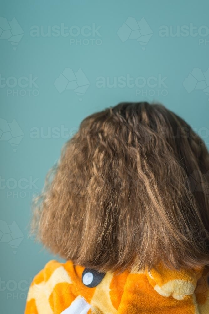 tween girl with crazy frizzy hair - Australian Stock Image