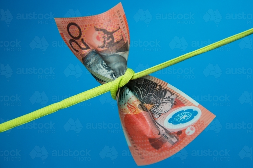 Twenty Dollar Note Tied in a Knot - Australian Stock Image