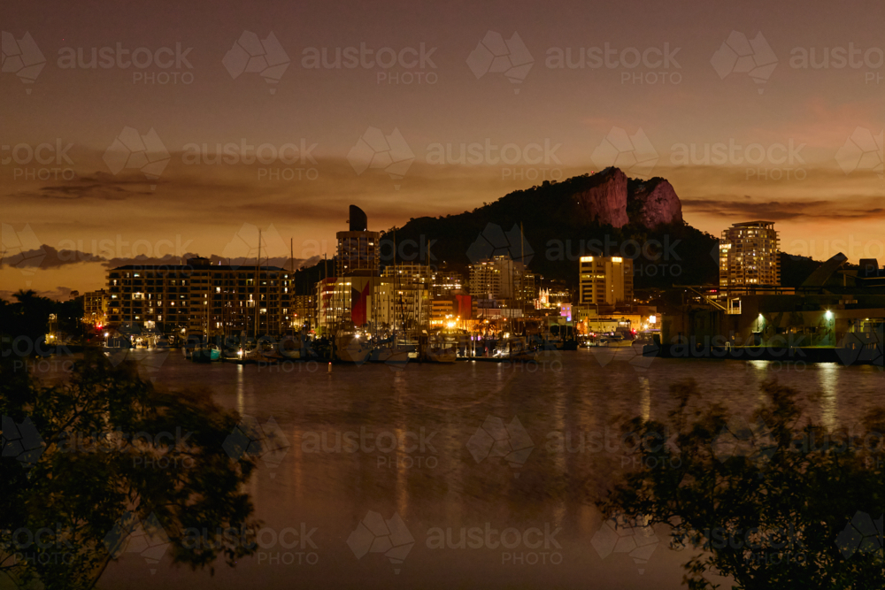 Twilight view of Townsville with Castle Hill in background - Australian Stock Image