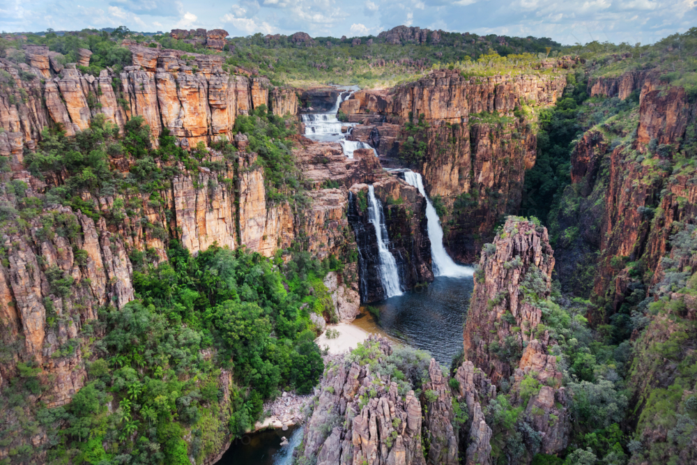 Twin Falls and surrounding rugged Arnhem Land Escarpment : Austockphoto Twin Falls and surrounding rugged Arnhem Land Escarpment - Australian Stock Image