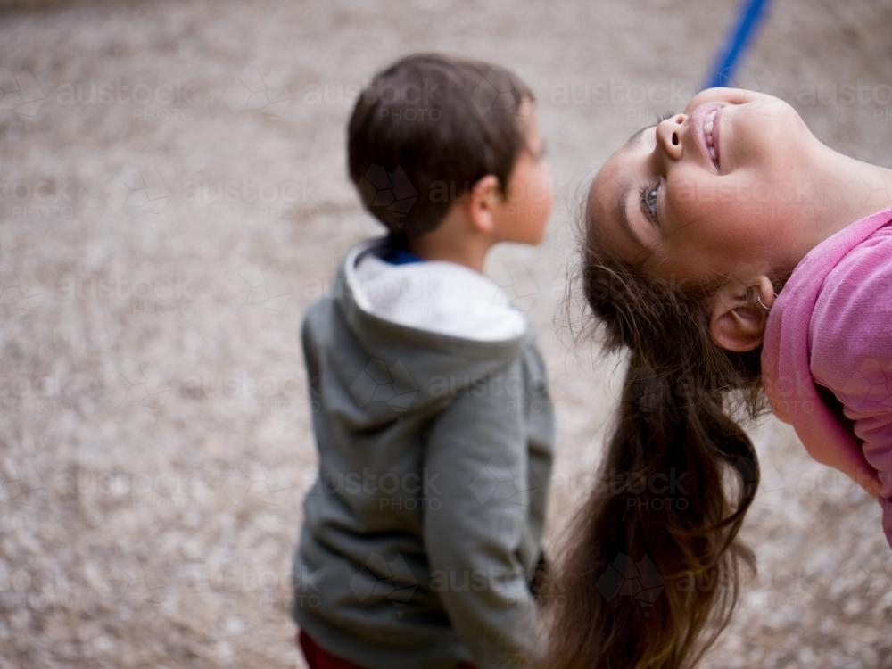 Two Aboriginal Children in Playground - Australian Stock Image