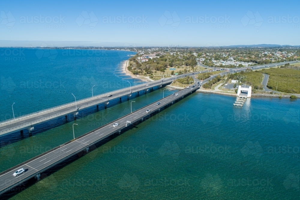 Two bridges, cars, and a bay. - Australian Stock Image