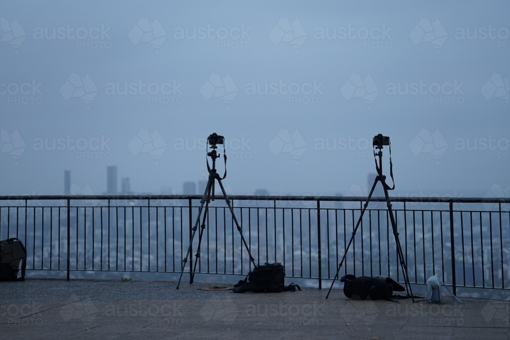 Two cameras set up for cloudy sunrise shot - Australian Stock Image