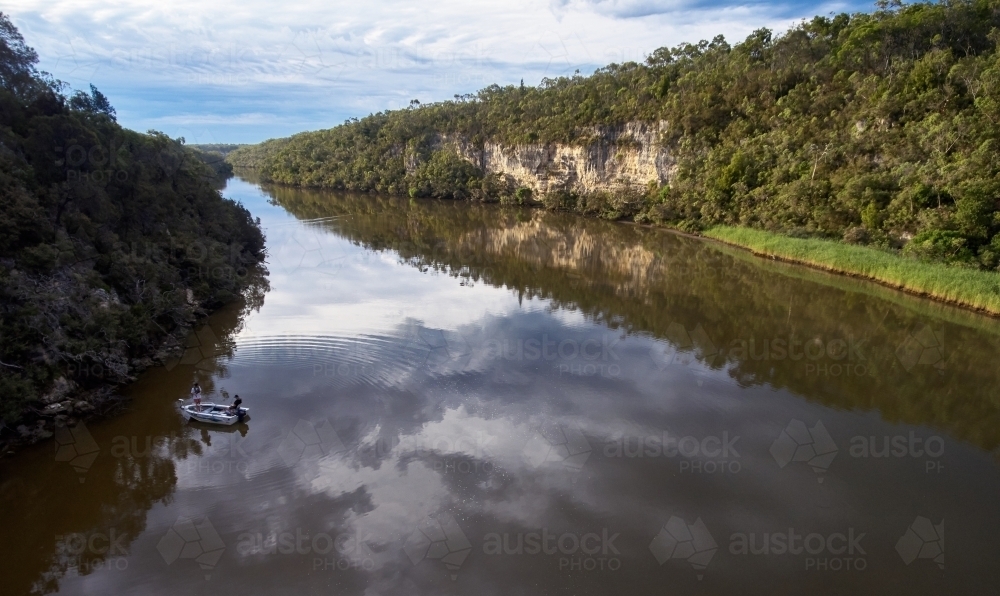 Two Fishermen in a Boat on Glenelg River - Australian Stock Image