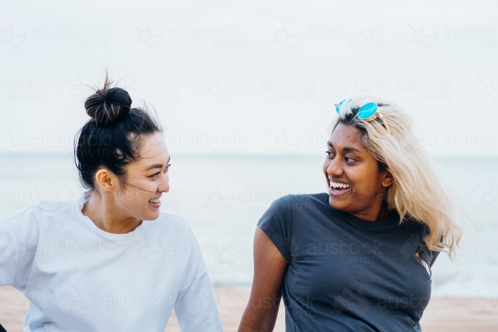 two friends at the beach - Australian Stock Image