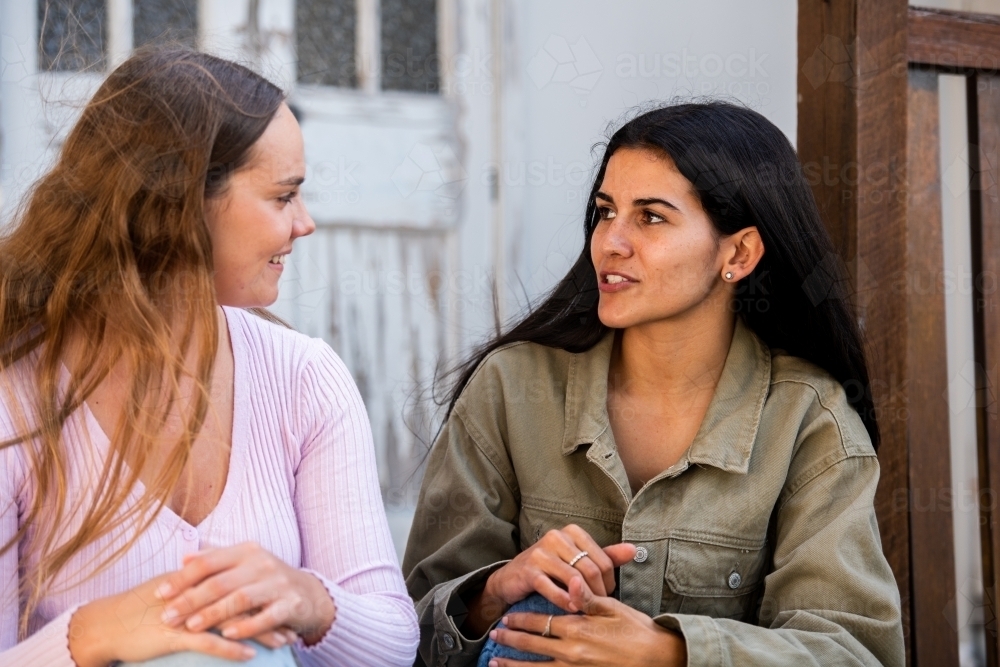 two friends chatting - Australian Stock Image