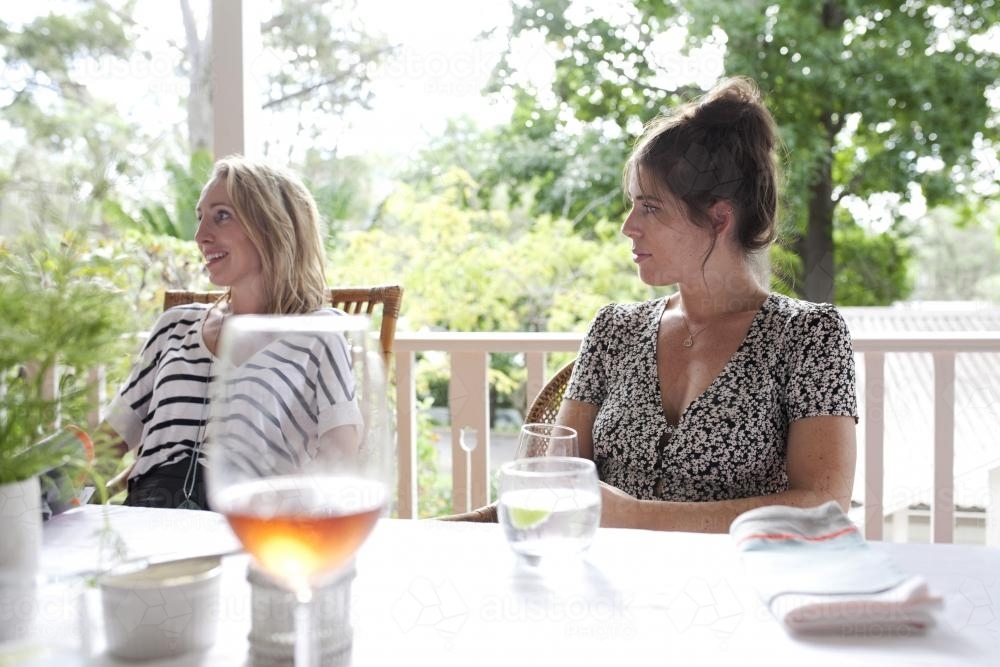 Two girls sitting at lunch - Australian Stock Image