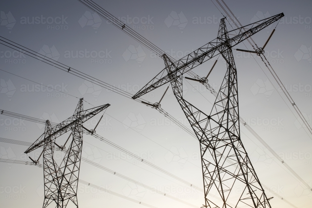 two high volate power lines at dusk - Australian Stock Image