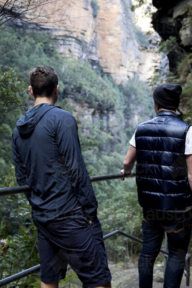 Two men on bush walk looking at scenery - Australian Stock Image