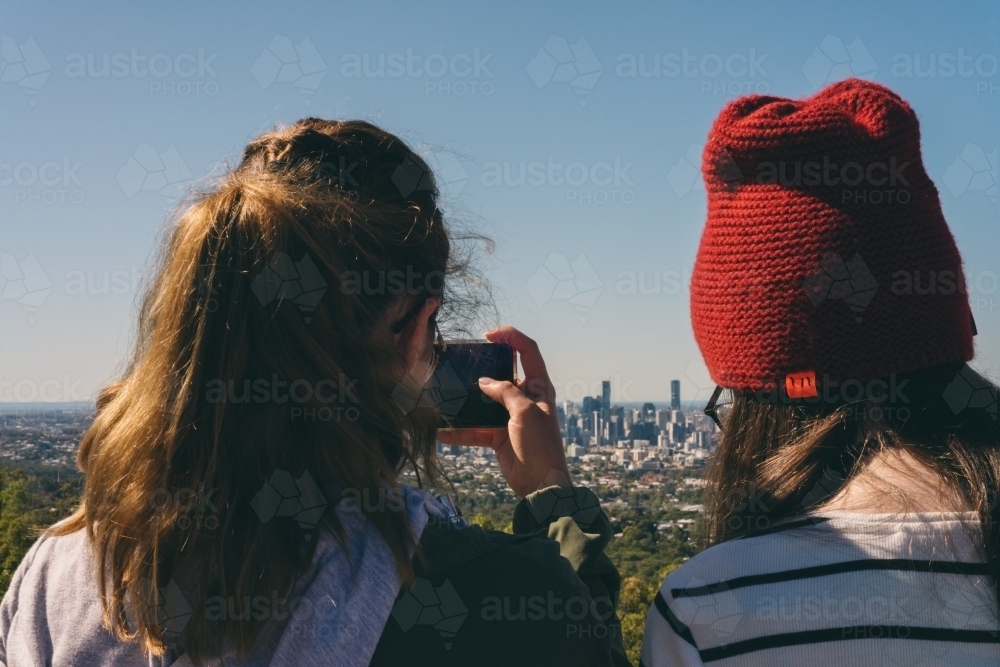 two taking photo at mt cootha scenic lookout - Australian Stock Image
