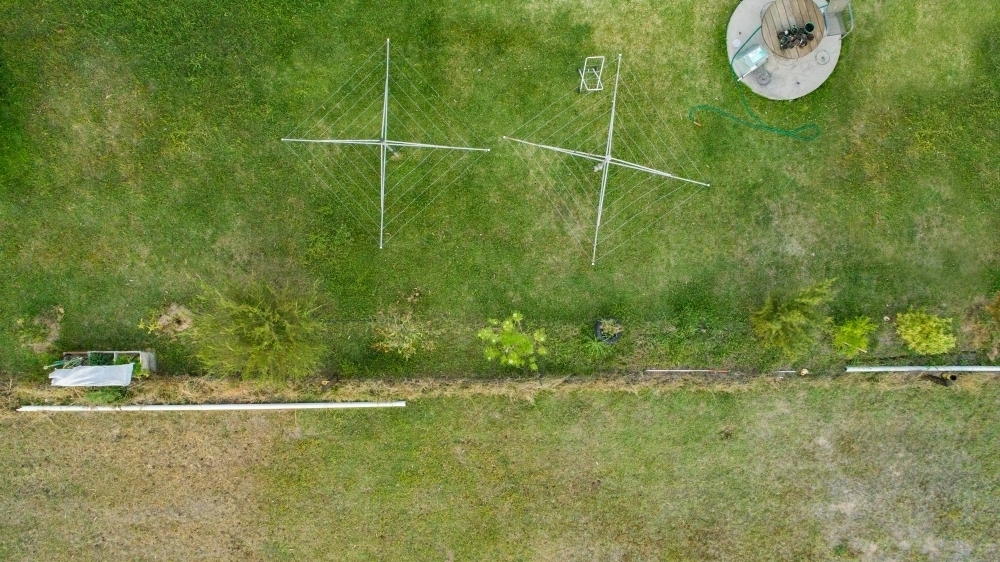 Two washing lines in backyard top down aerial shot - Australian Stock Image