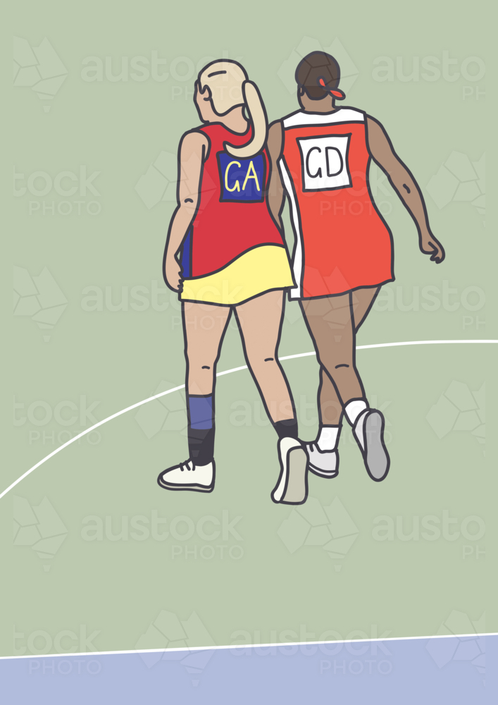 Two women in action on netball court on game day - Australian Stock Image