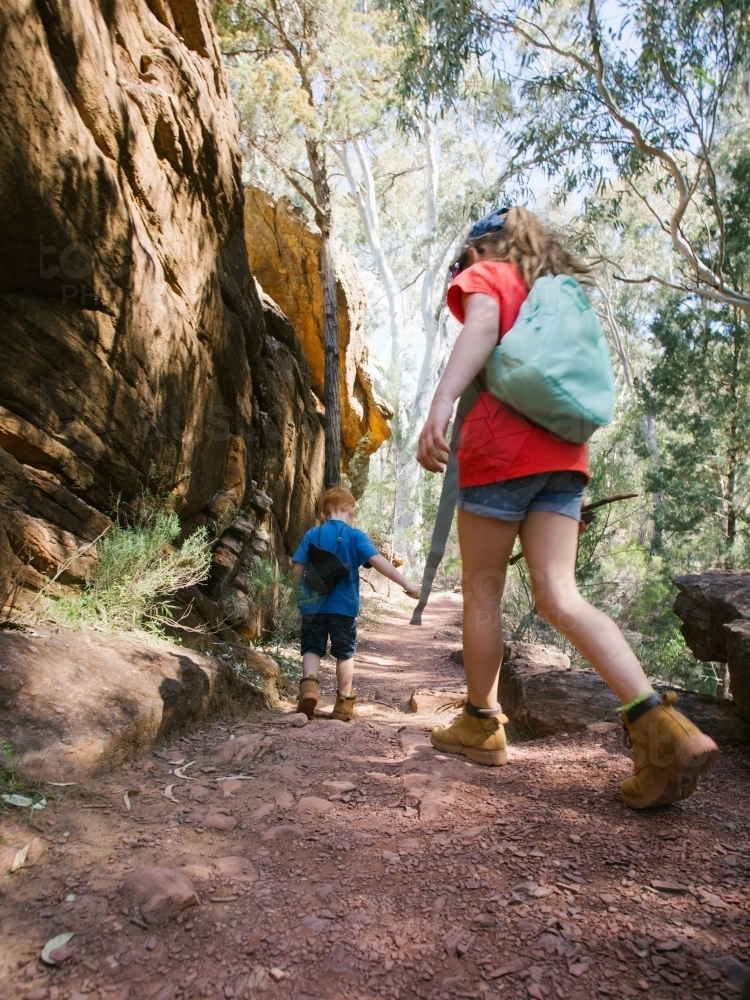 Two young kids going on a bush walk - Australian Stock Image