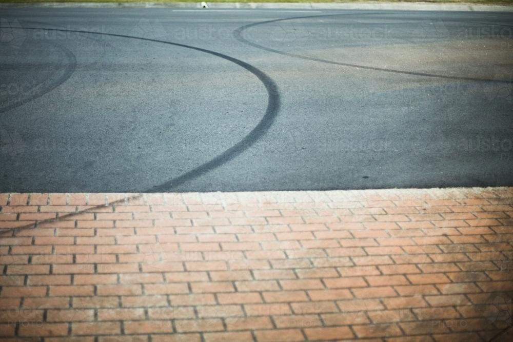 Tyre marks on a suburban road. - Australian Stock Image