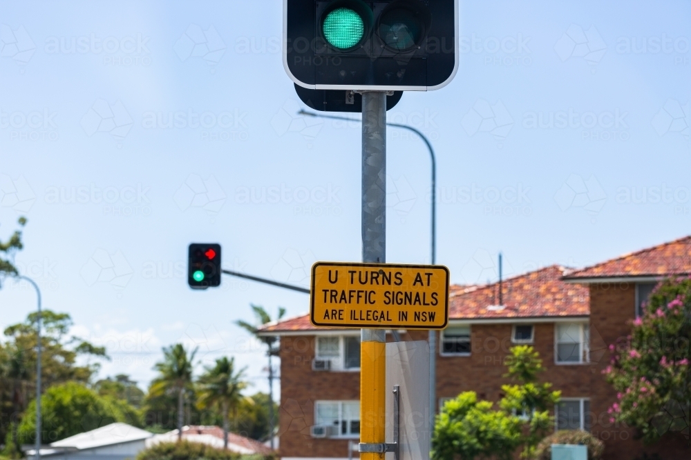 Image of u turns at traffic signals are illegal in NSW sign at lights