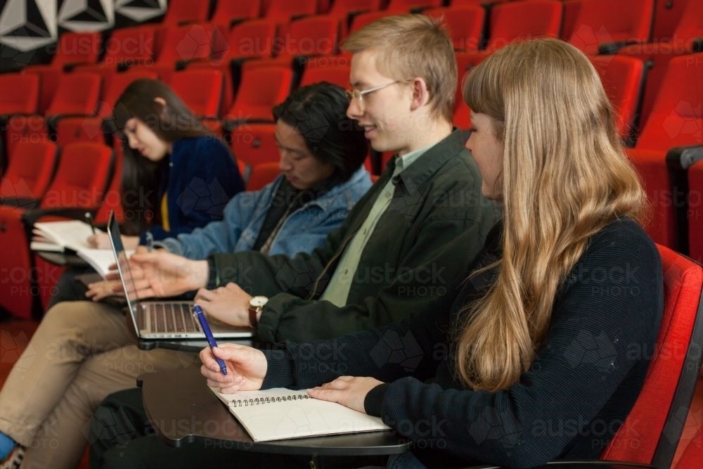 university students attending a lecture - Australian Stock Image
