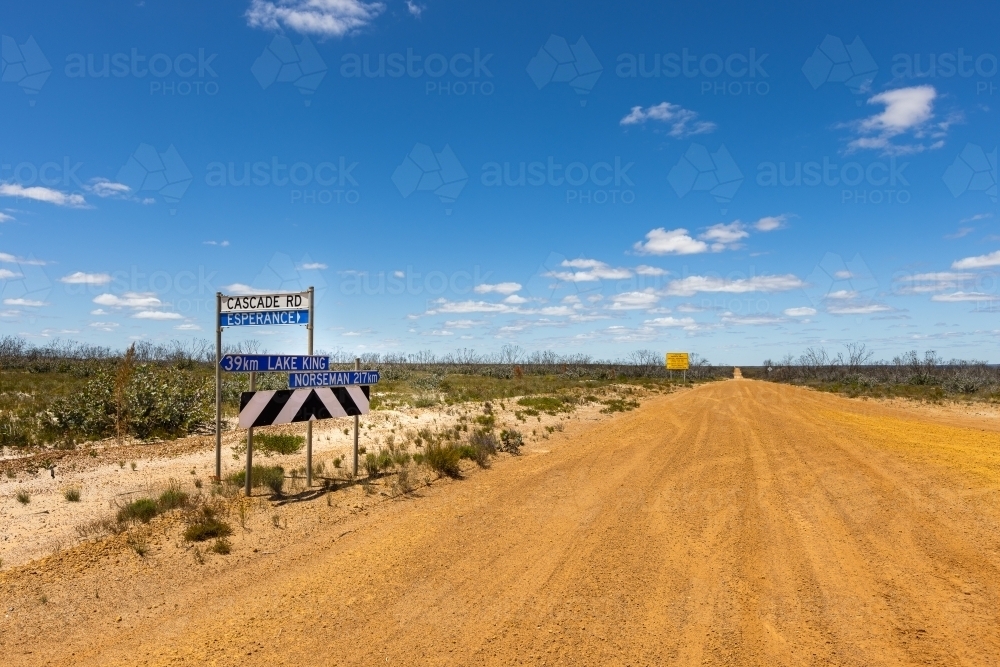 unsealed rural road between Lake King and Norseman in WA - Australian Stock Image