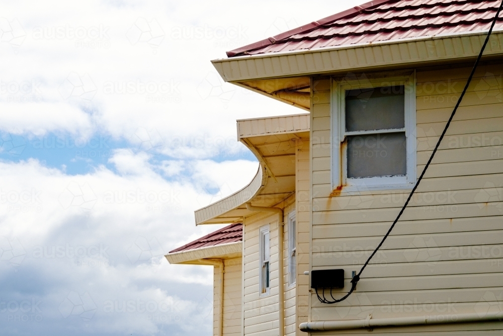 Image of Unusual curved roof line of house Austockphoto