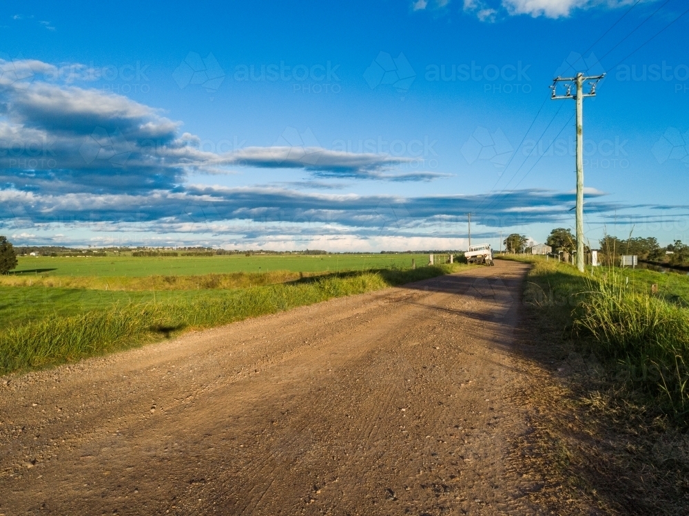 Ute beside rural dirt road in country - Australian Stock Image