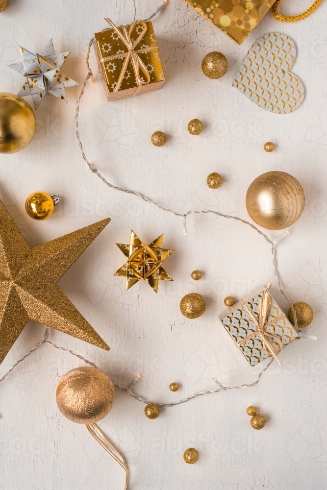 various christmas items in gold - Australian Stock Image