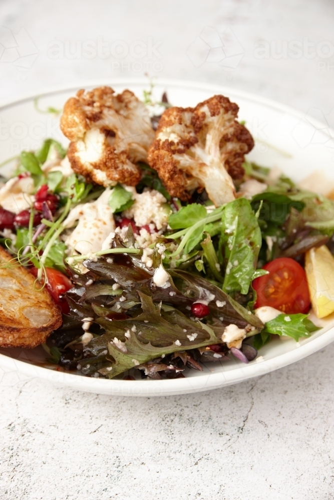 Vegetarian cauliflower salad in bowl - Australian Stock Image