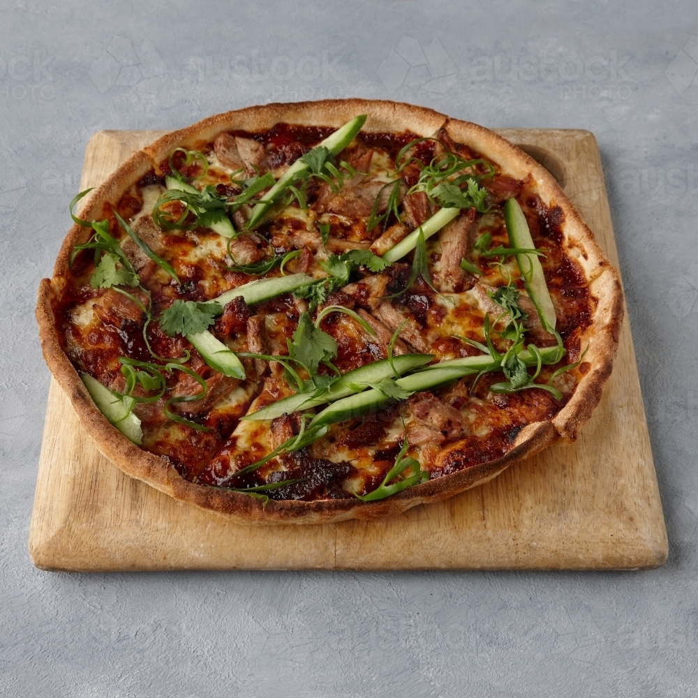 Vegetarian pizza on table - Australian Stock Image
